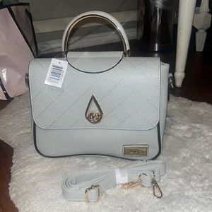 BellaRusso Convertible Crossbody
Structured Handbag New With Tag
